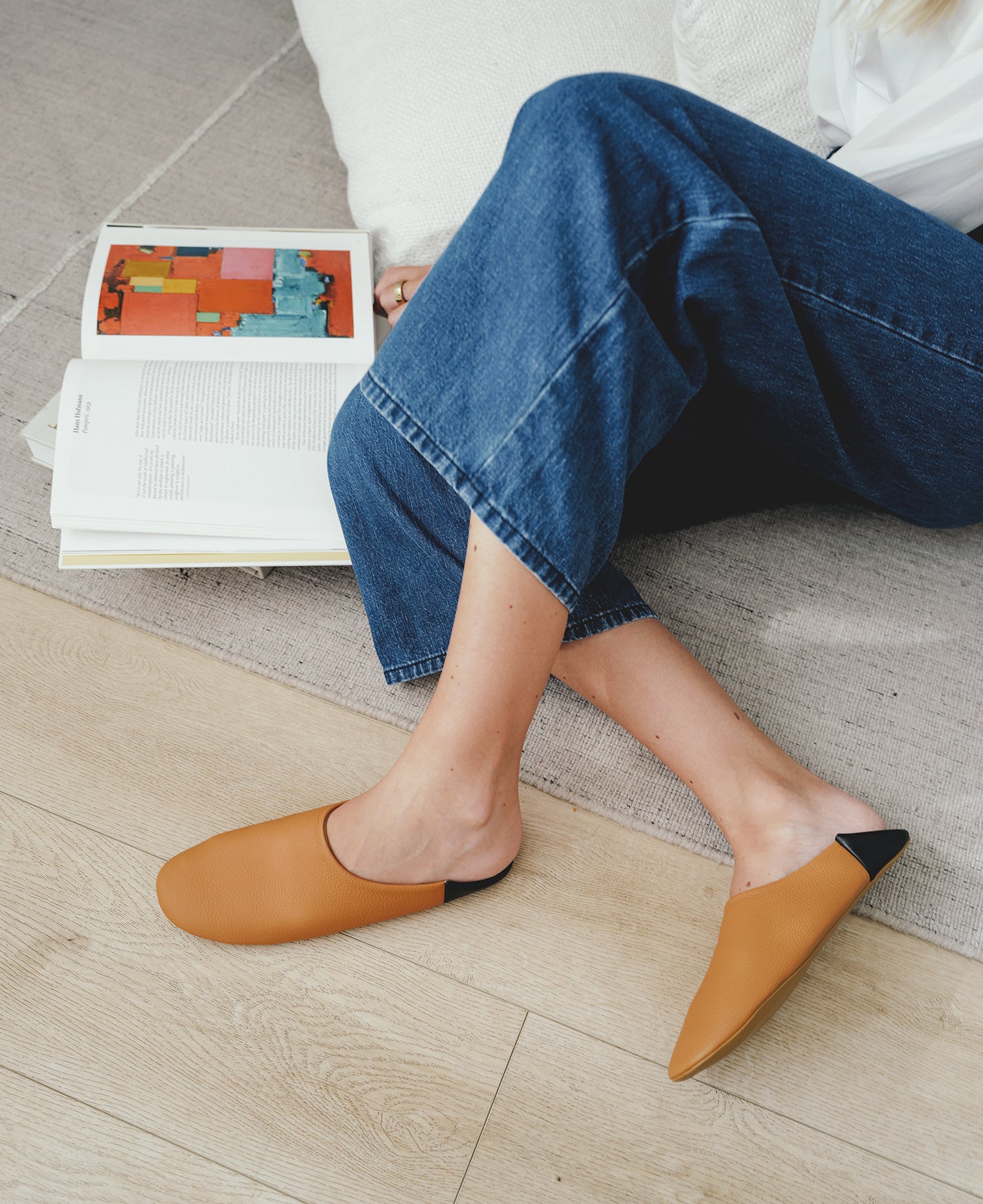 Women’s fall leather house slippers on model